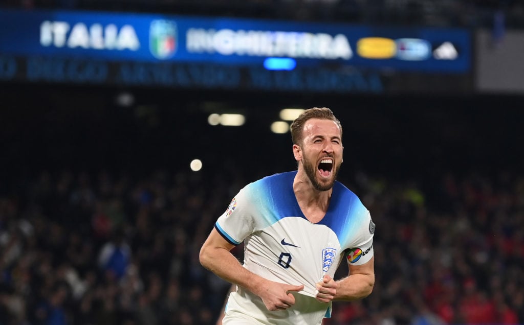 Harry Kane of England celebrates after scoring their sides second goal during the UEFA EURO 2024 qualifying round group C match between Italy and E...