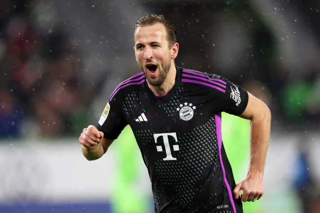Harry Kane of Bayern Munich celebrates after scoring their team's second goal during the Bundesliga match between VfL Wolfsburg and FC Bayern Münch...