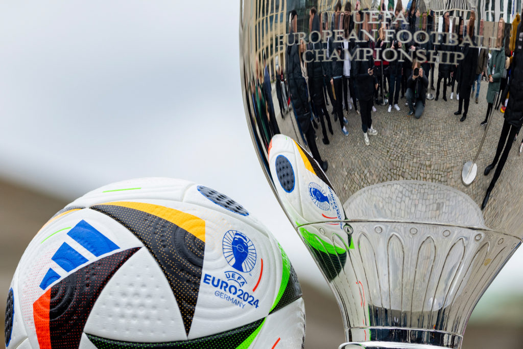 The UEFA Euro 2024 trophy and official ball are seen on public display in front of the Brandenburger Gate in Berlin, on April 24, 2024. The UEFA EU...