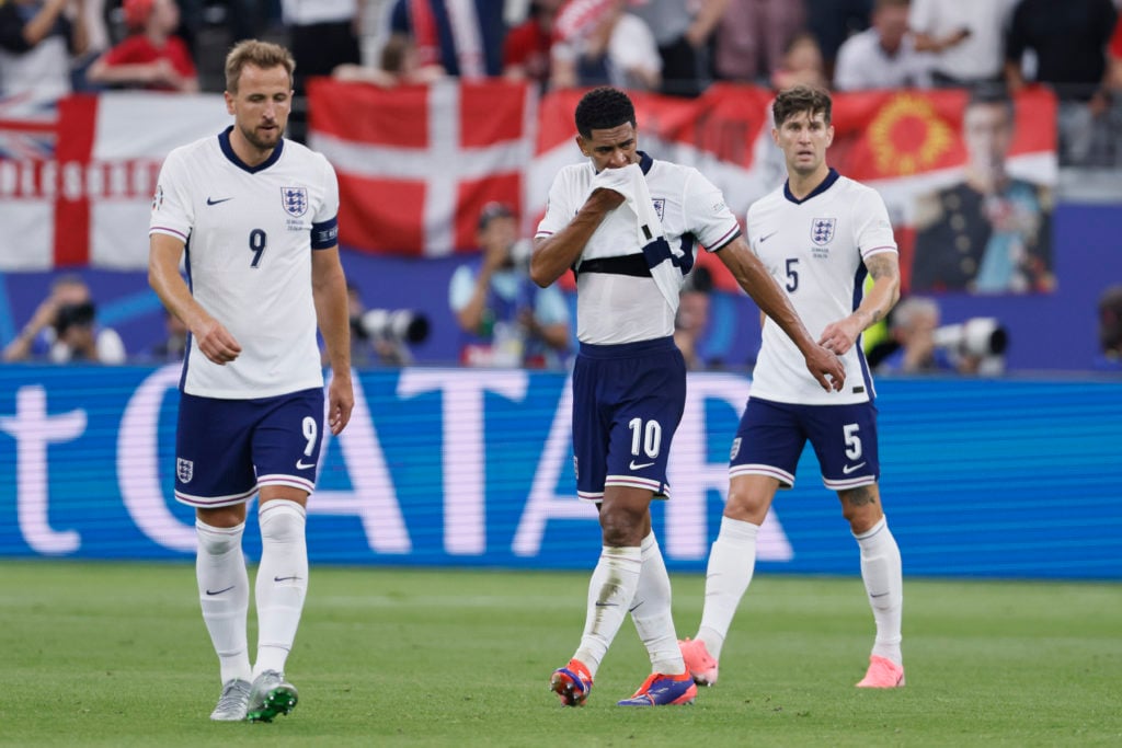 Harry Kane and Jude Bellingham of England look dejected during the UEFA EURO 2024 group stage match between Denmark and England at Frankfurt Arena ...