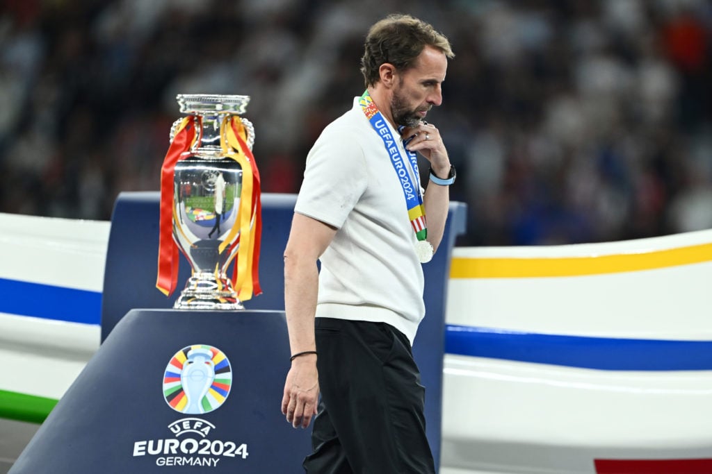 Gareth Southgate, Head Coach of England, walks past the UEFA Euro 2024 Henri Delaunay Trophy after defeat in the UEFA EURO 2024 final match between...
