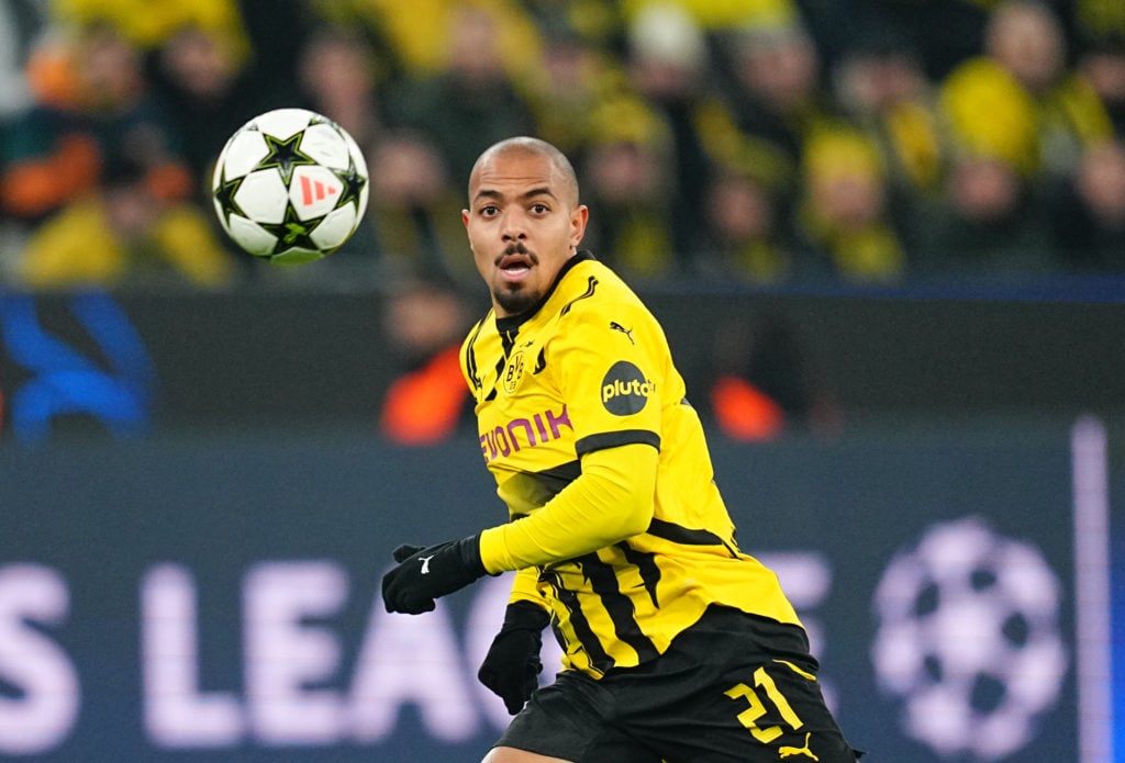 Donyell Malen of Borussia Dortmund controls the ball during the Champions League Round 6 match between Borussia Dortmund v FC Barcelona at Signal ...