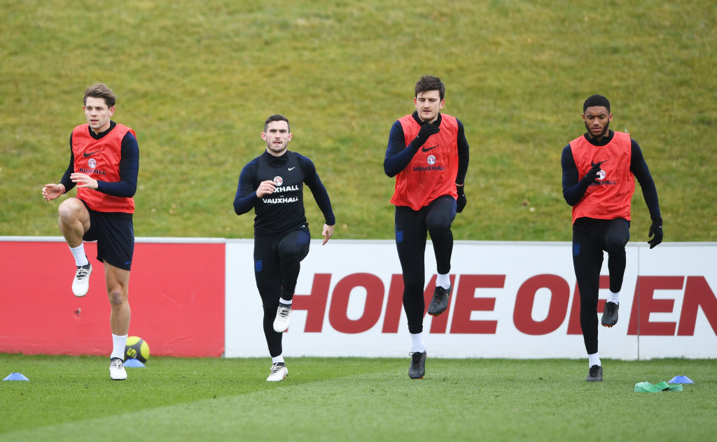 during an England training session on the eve of their international friendly against the Netherlands at St Georges Park on March 22, 2018 in Burto...