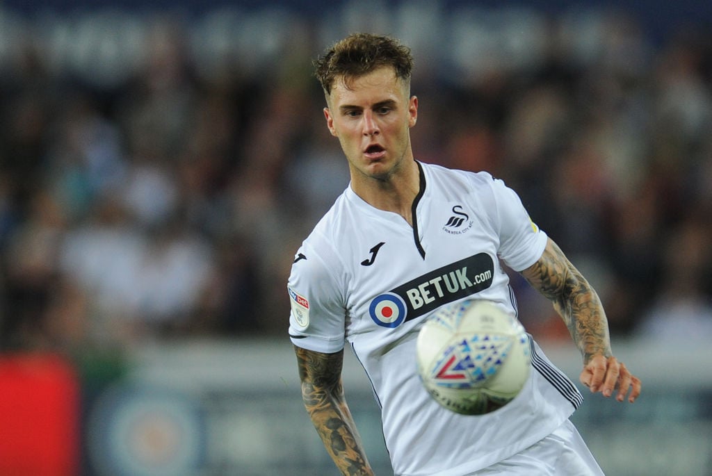 Joe Rodon signed his first - Swansea City Football Club