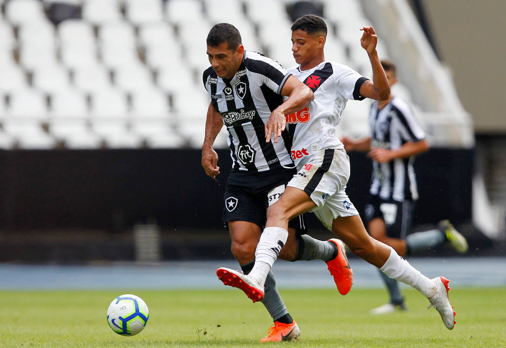 Diego Souza of Botafogo fights for the ball with Marrony of Vasco da Gama during a match between Botafogo and Vasco da Gama as part of the Brasilei...