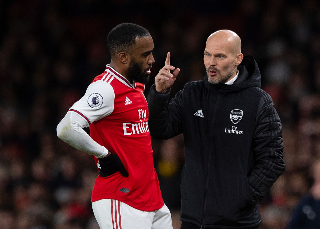 LONDON, ENGLAND - DECEMBER 05: Arsenal Interim Head Coach Freddie Ljungberg talks to Alexandre Lacazette during to the Premier League match between...