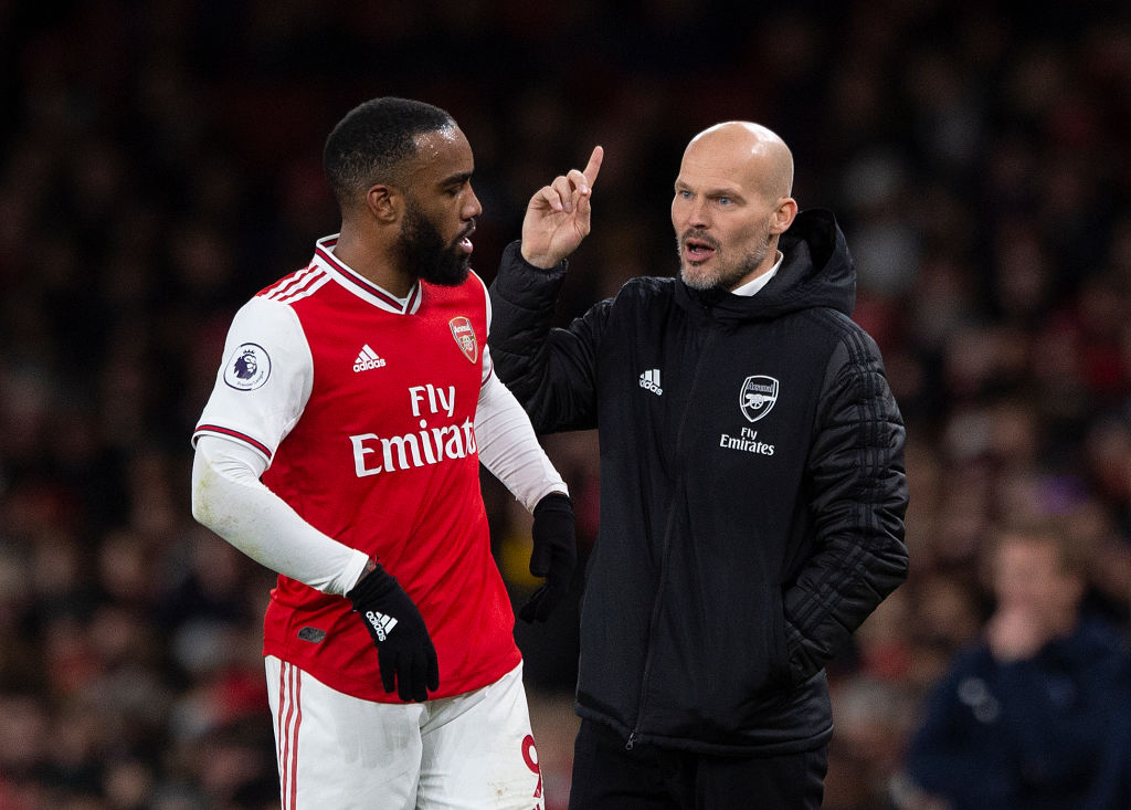 LONDON, ENGLAND - DECEMBER 05: Arsenal Interim Head Coach Freddie Ljungberg talks to Alexandre Lacazette during to the Premier League match between...