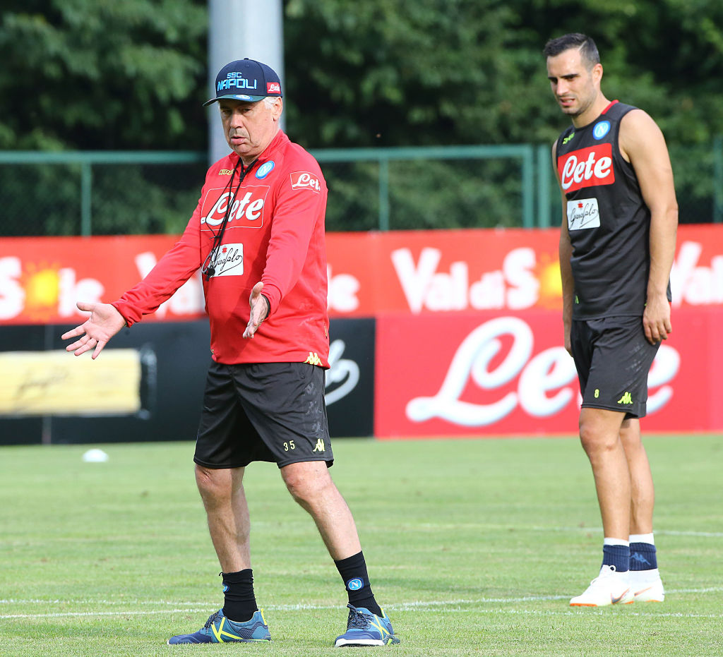 Napoli's Italian coach Carlo Ancelotti gestures next to...