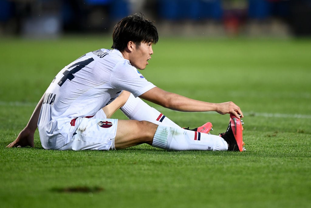 Takehiro Tomiyasu of Bologna FC suffers an injury during the...