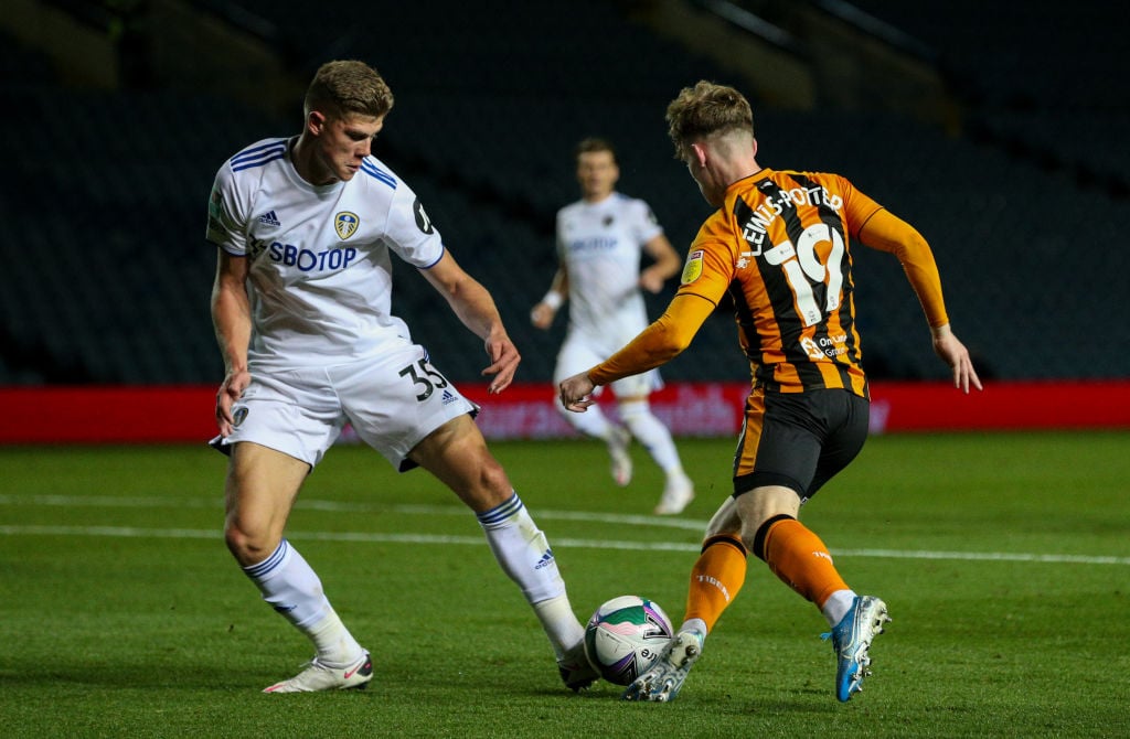 Ben Parker congratulates Charlie Cresswell following Leeds United debut