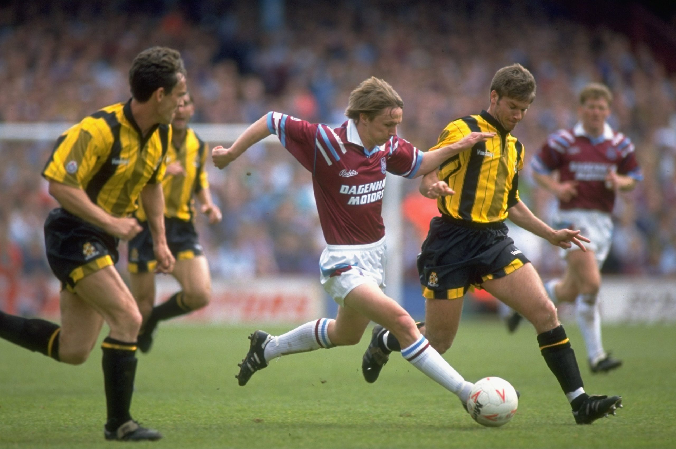8 May 1993:  Kevin Keen of West Ham United takes on Alan Kimble of Cambridge United during the League Division One match at Upton Park in London.  ...