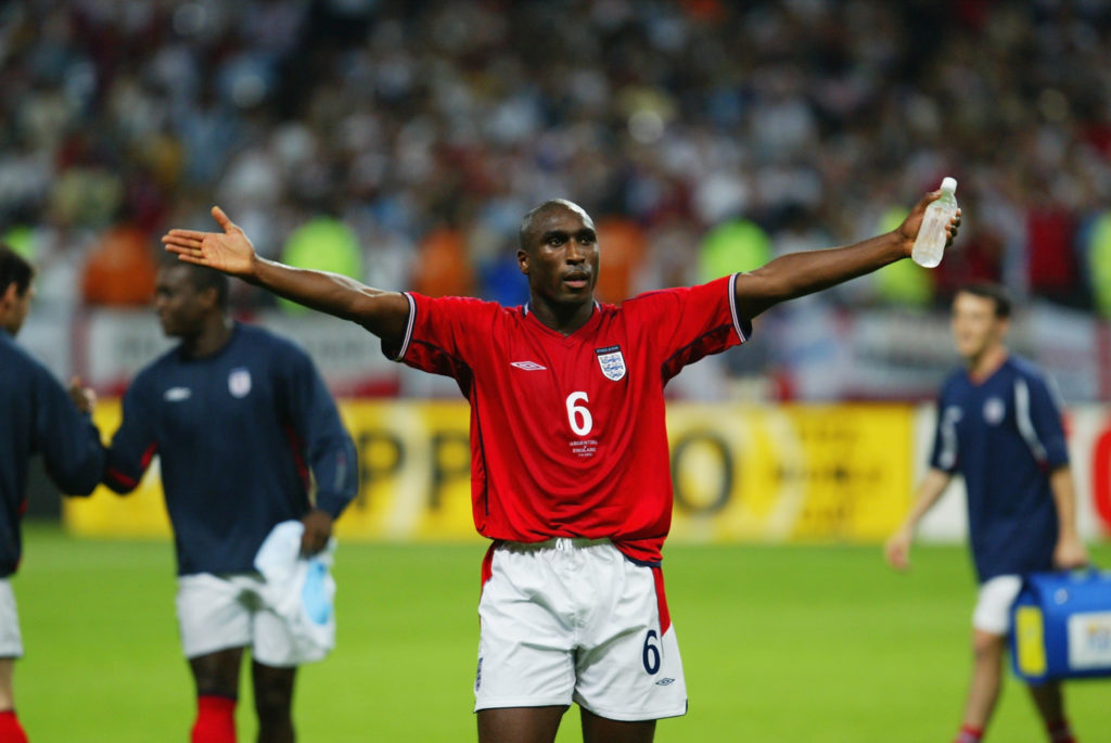 Sol Campbell of England celebrates