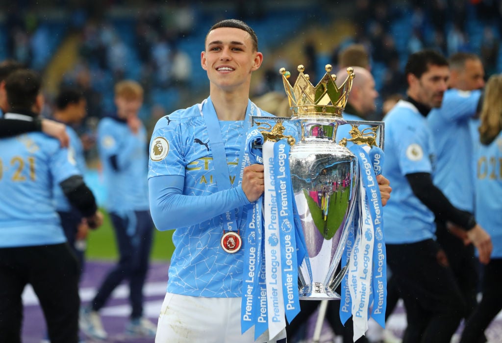manchester-city-midfielder-phil-foden-celebrates-premier-league-trophy-everton-etihad-stadium