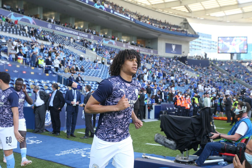 Manchester City defender Nathan Ake warming up before the Champions League final