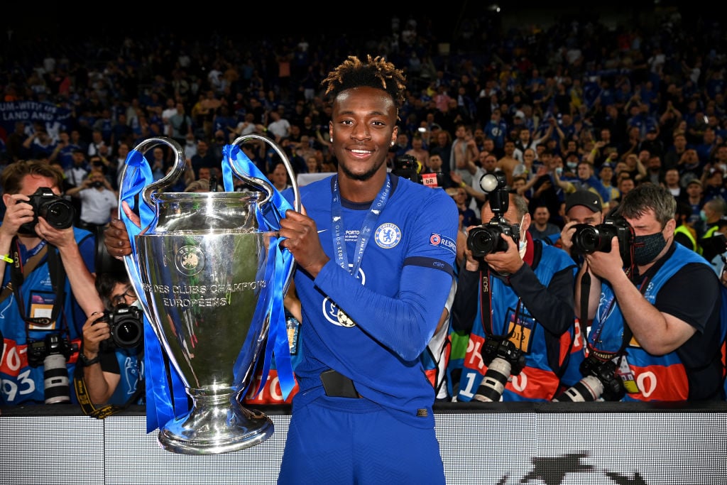 Tammy Abraham holding the Champions League trophy following Chelsea's win