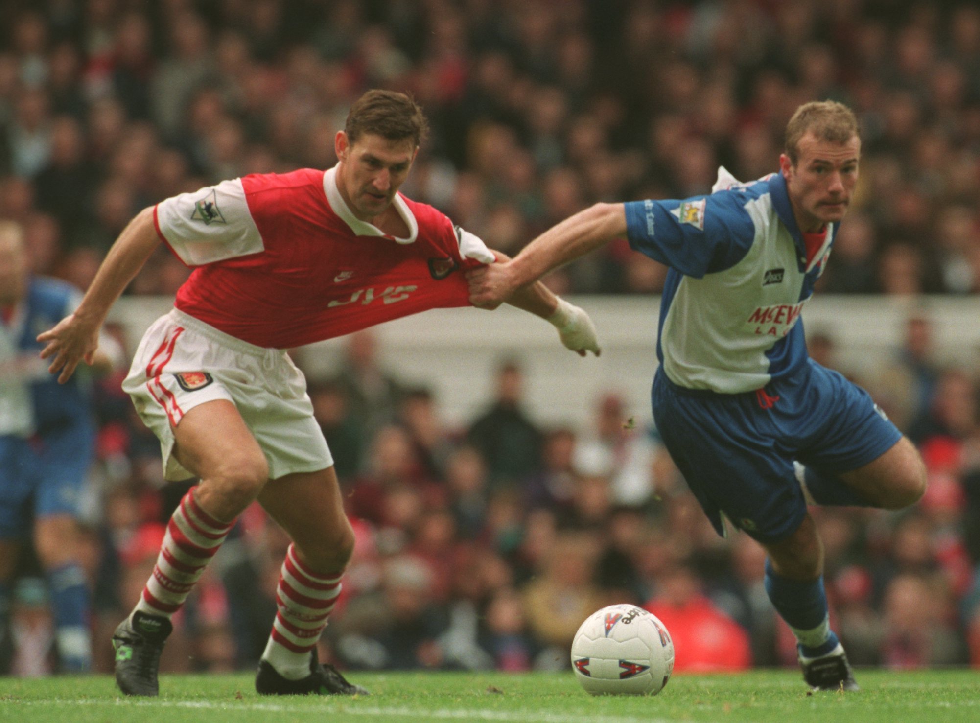 25 NOV 1995: TONY ADAMS OF ARSENAL IS CHALLENGED BY ALAN SHEARER OF BLACKBURN ROVERS DURING THE PREMIER LEAGUE MATCH AT HIGHBURY. THE MATCH ENDED ...