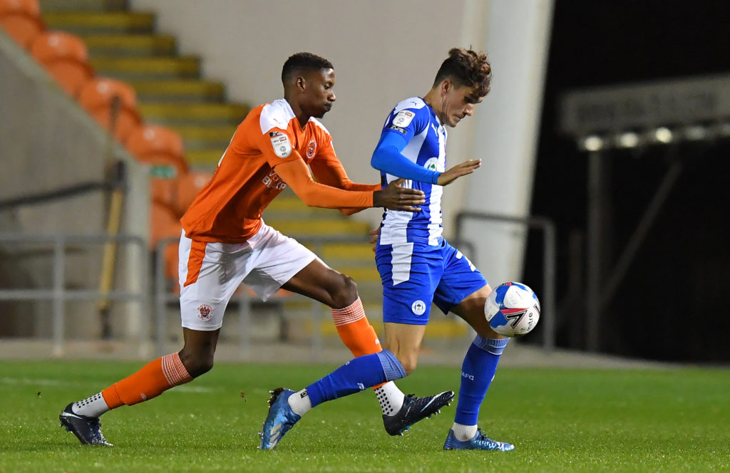 celtic-newcastle-united-transfer-target-wigan-athletic-striker-kyle-joseph-dribbles-blackpool-marvin-ekpiteta-league-one