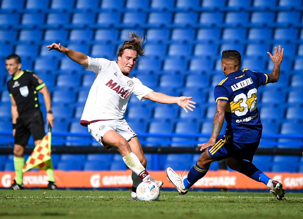 leeds-united-transfer-gossip-norwich-city-target-lanus-forward-pedro-de-la-vega-dribbles-past-boca-juniors-agustin-almendra