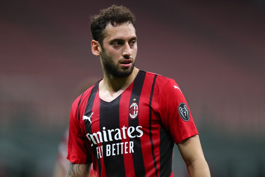 arsenal-transfer-target-hakan-calhanoglu-serie-a-ac-milan-looks-on-cagliari-san-siro