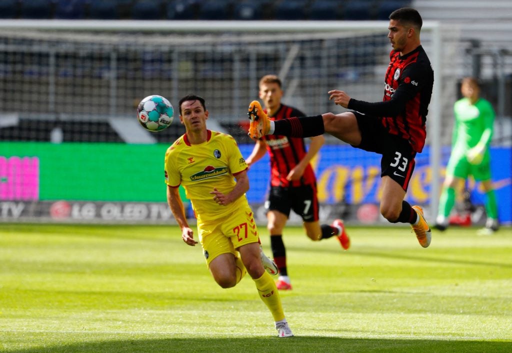 man-city-transfer-target-eintracht-frankfurt-striker-andre-silva-controls-ball-freiburg-nicolas-hoefler-bundesliga