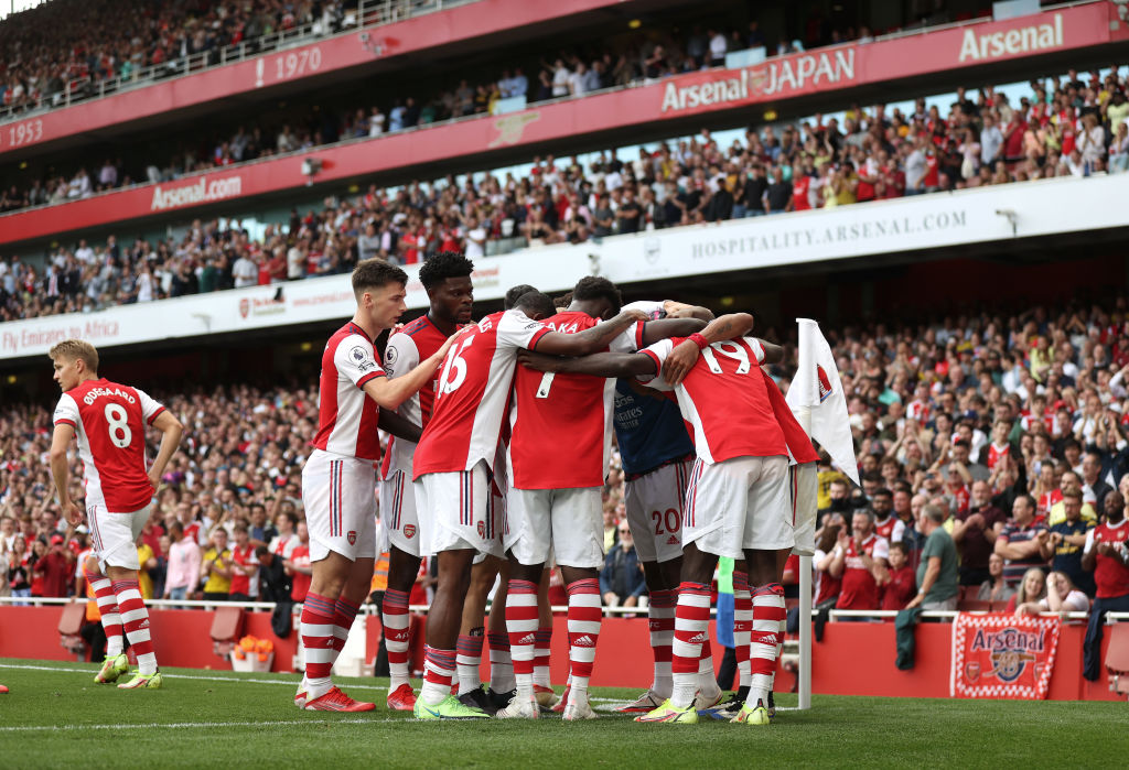 Arsenal celebrate their first goal vs Norwich
