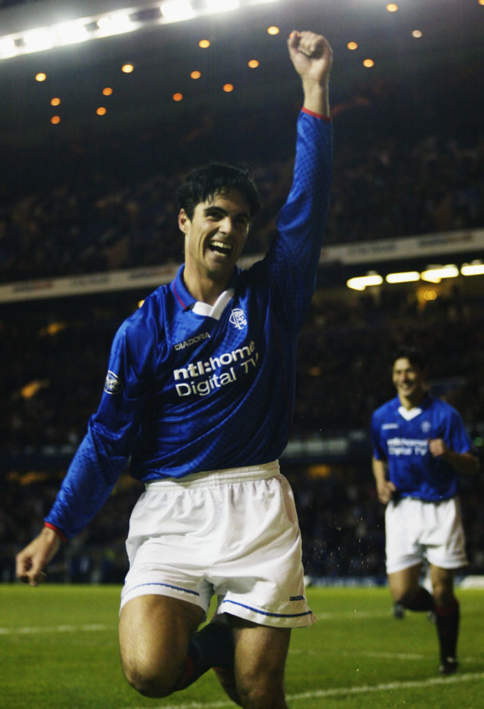 Mikel Arteta of Rangers celebrates scoring the third goal