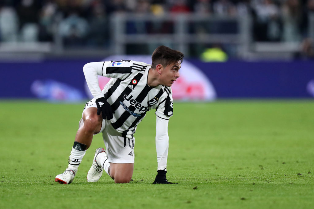 Paulo Dybala of Juventus Fc  lies on the ground during the