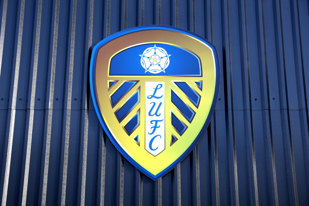 A general view of a Leeds United crest on a wall outside the stadium prior to the Premier League match between Leeds United and Brentford at Elland...