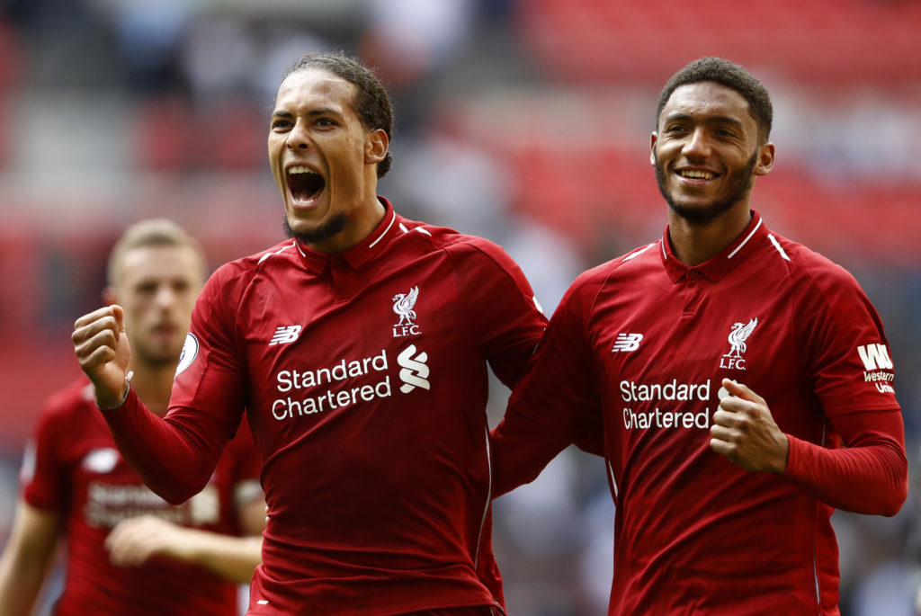 Virgil van Dijk and Joe Gomez celebrate after a Liverpool win