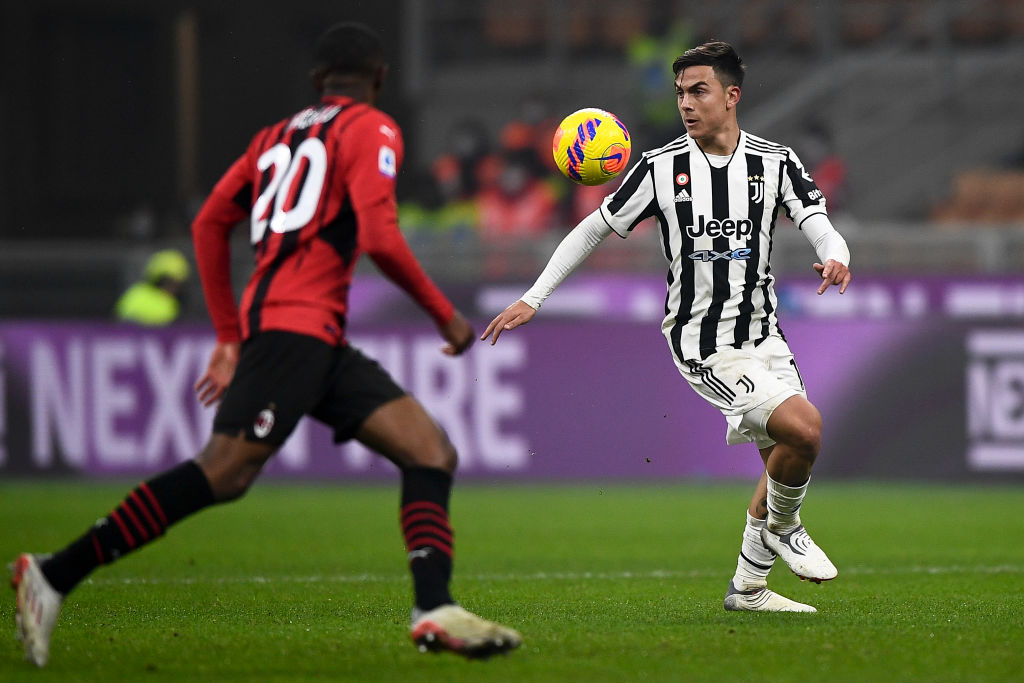 Paulo Dybala (R) of Juventus FC is challenged by Pierre