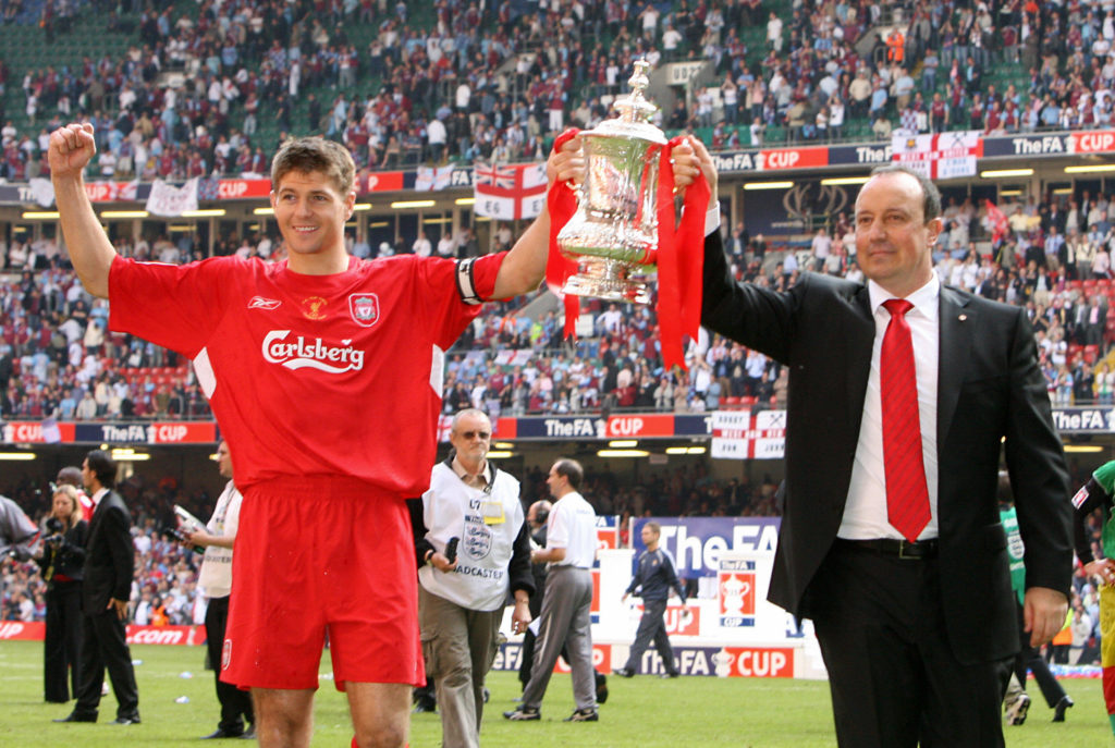 Liverpool manager Raphael Benitez (R) an