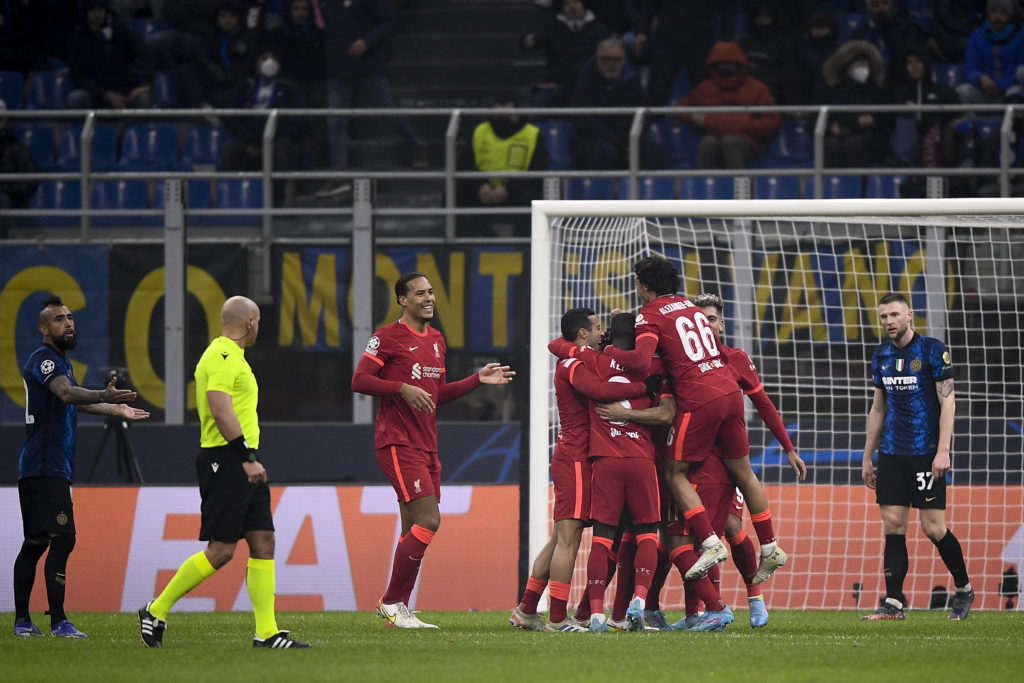 Mohamed Salah (C) of Liverpool FC celebrates with his...