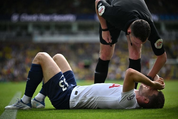 Photo shows Ben Davies wearing protective boot after Tottenham tour