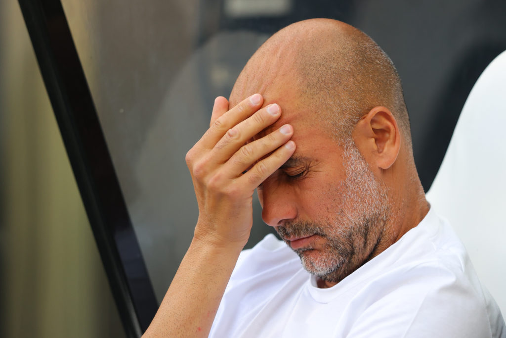 Josep 'Pep' Guardiola, manager of Manchester City, looks dejected during the Premier League match between Newcastle United and Manchester City at St. James Park on August 21, 2022