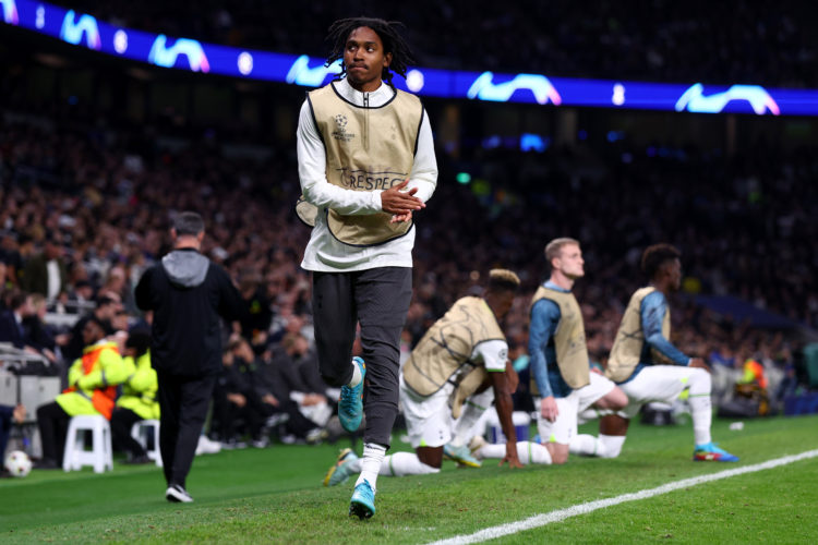 LONDON, ENGLAND - OCTOBER 26: Djed Spence of Tottenham Hotspur reciprocates applause from the Tottenham supporters whist warming up during the UEFA...