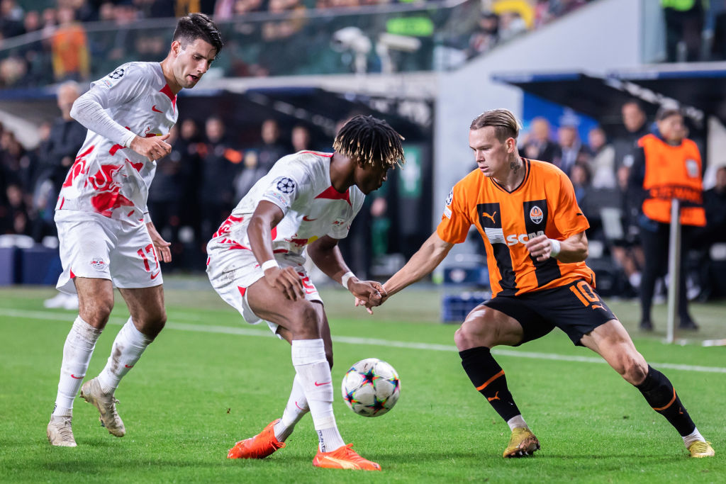Dominik Szoboszlai (L), Mohamed Simakan (C) of RB Leipzig,
