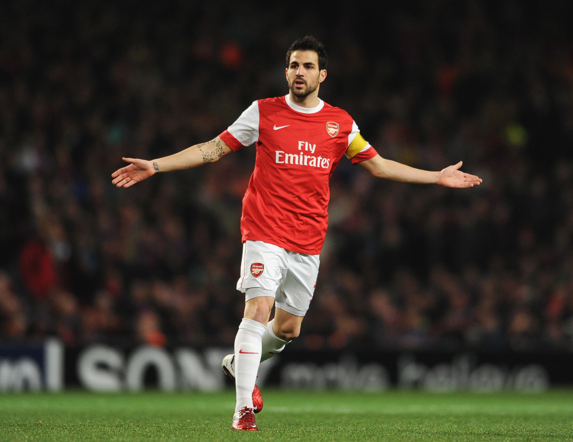 Cesc Fabregas of Arsenal shows his frustration during the UEFA Champions League round of 16 first leg match between Arsenal and Barcelona at the Em...