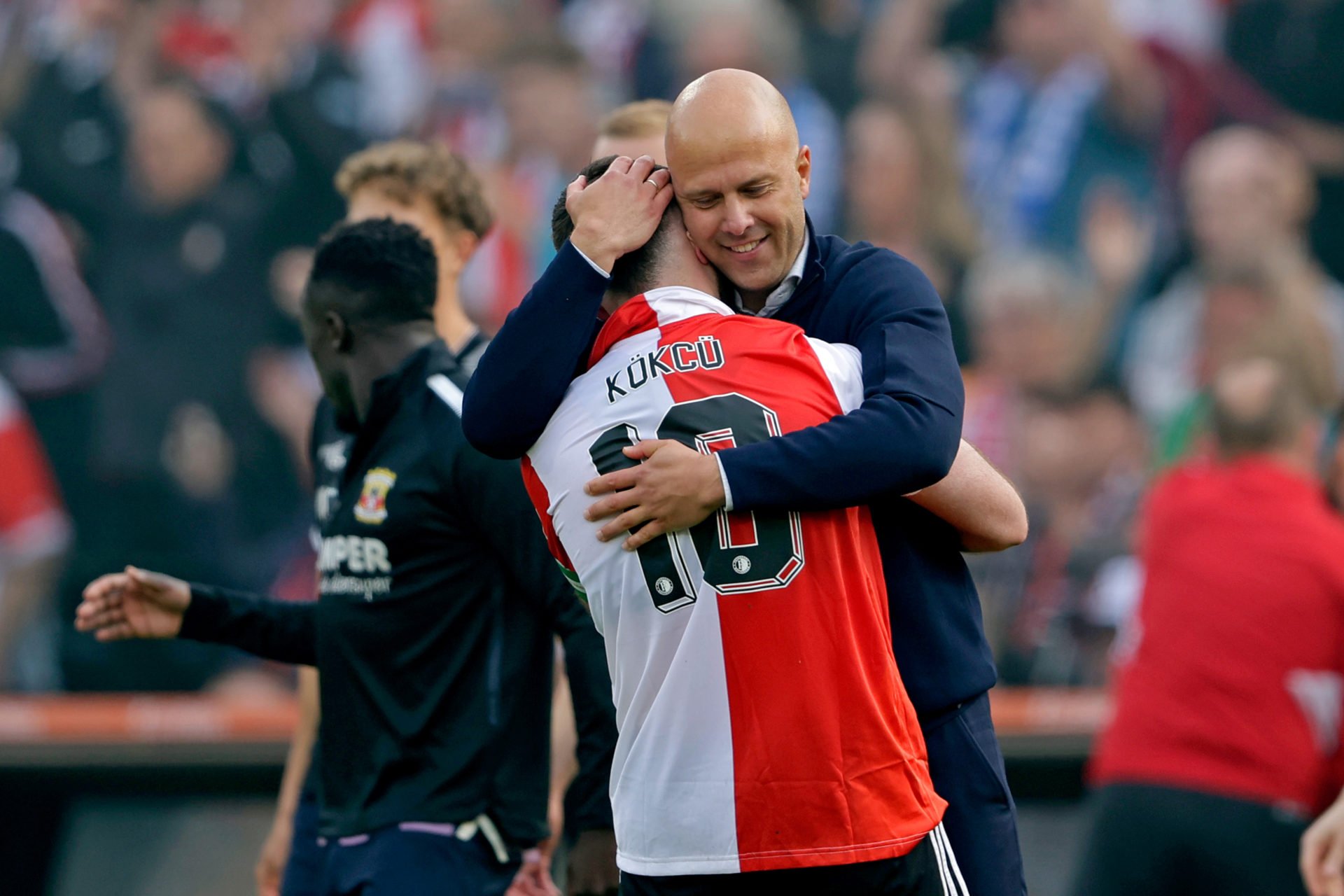 coach Arne Slot of Feyenoord, Orkun Kokcu of Feyenoord celebrates the championship during the Dutch Eredivisie  match between Feyenoord v Go Ahead ...