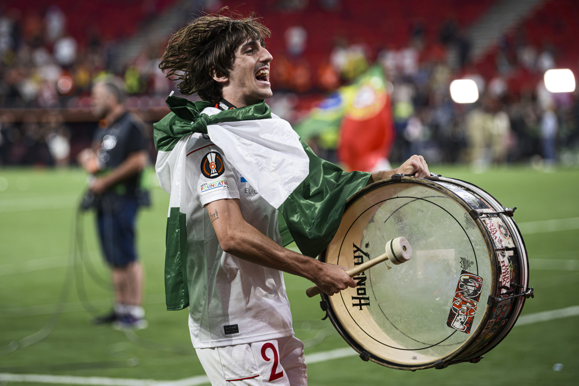 Bryan Gil of Sevilla FC celebrates by playing a drum after...
