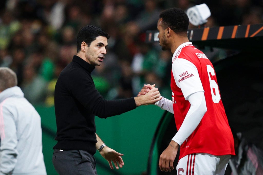 Arsenal manager Mikel Arteta with defender Gabriel Magalhaes