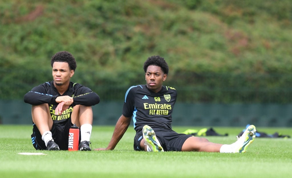 (L-R) Ethan Nwaneri and Myles Lewis-Skelly of Arsenal during a training session at London Colney on August 05, 2023 in St Albans, England.