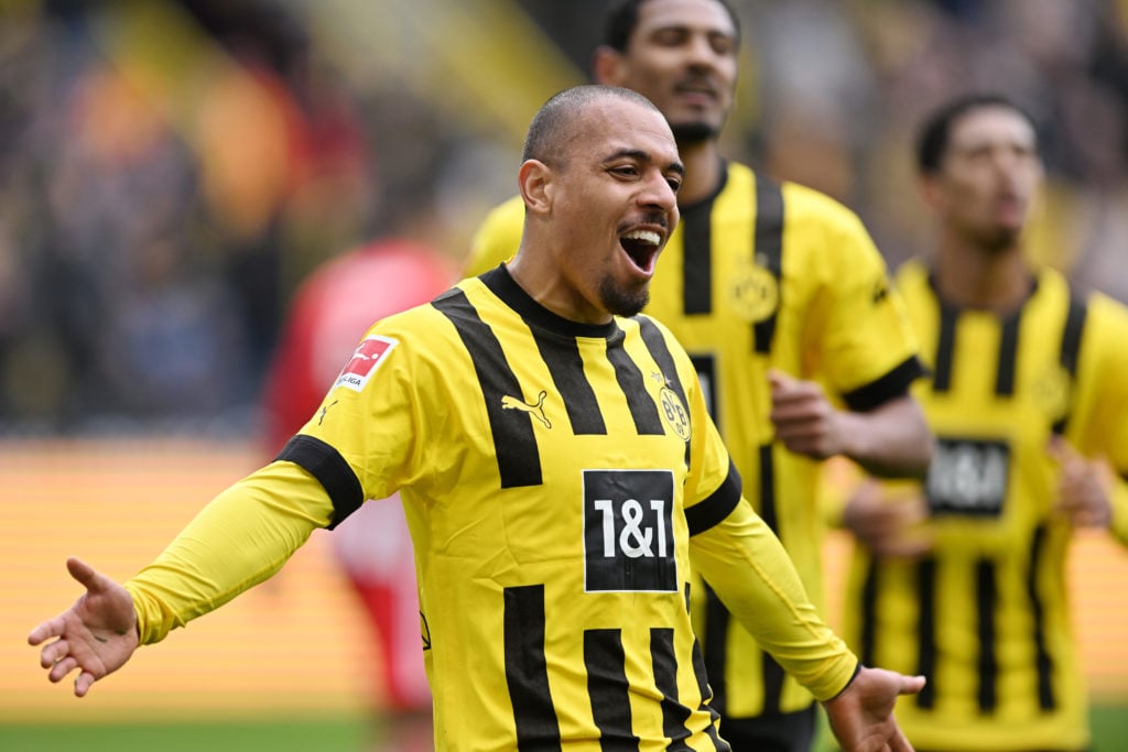 Donyell Malen of Borussia Dortmund celebrates after scoring their sides first goal during the Bundesliga match between Borussia Dortmund and 1. FC ...