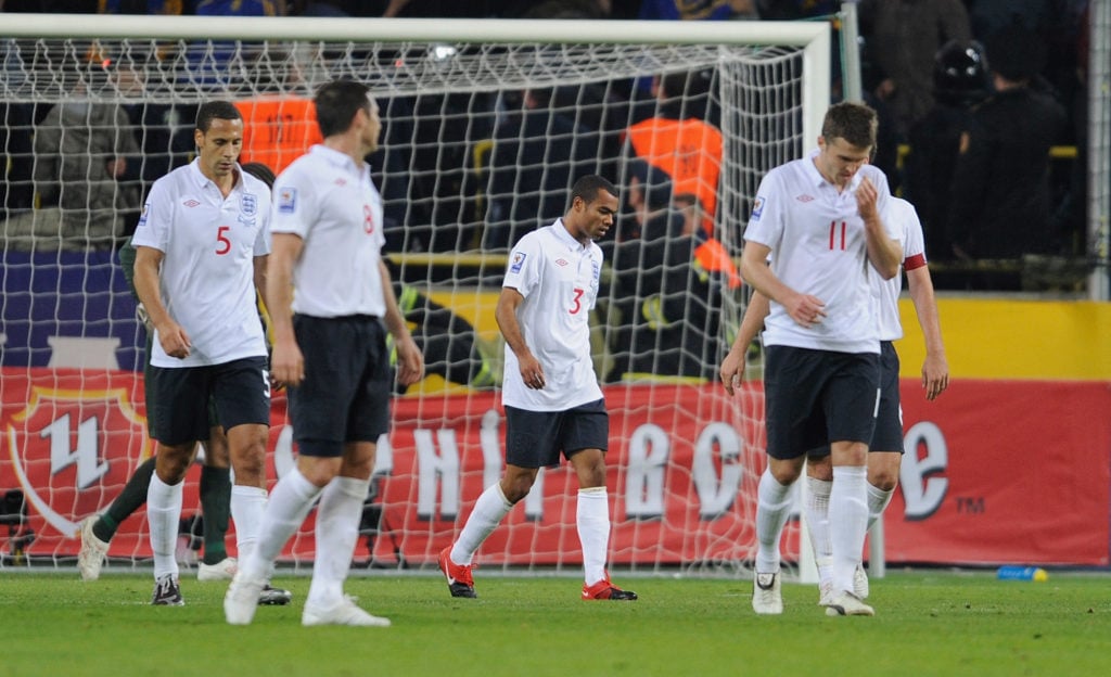 Ashley Cole of England reacts with teammates after conceding to Ukraine in 2010 World Cup qualifier