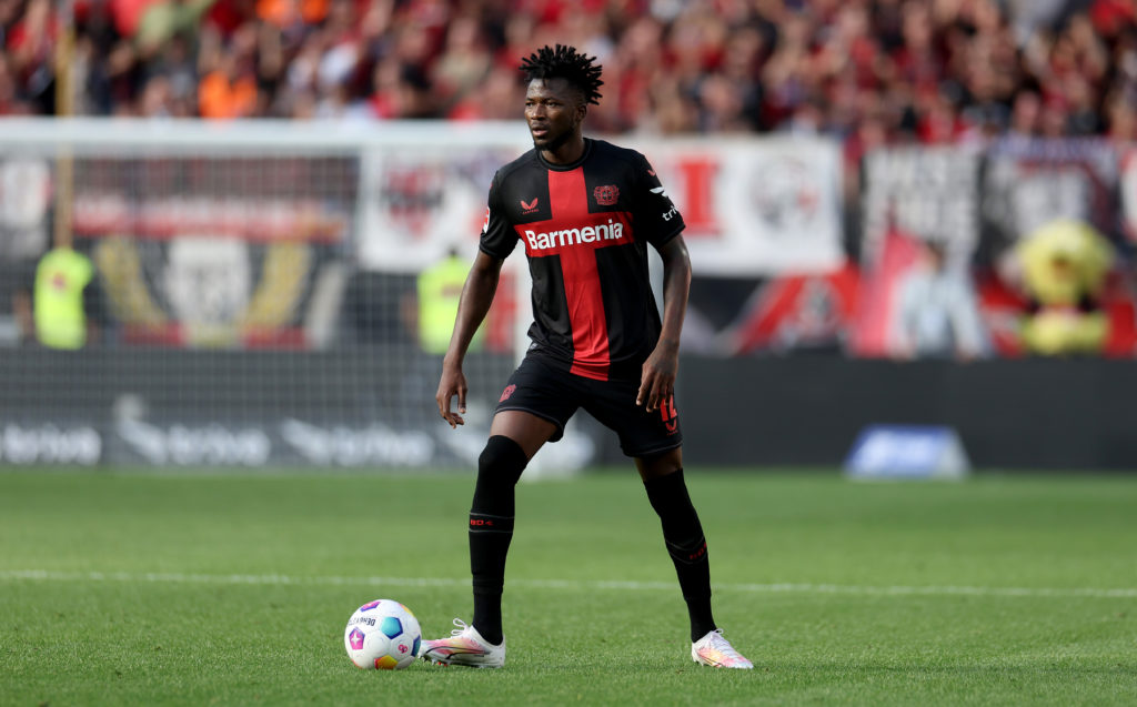 Edmond Tapsoba of Bayer Leverkusen runs with the ball during the Bundesliga match between Bayer 04 Leverkusen and 1. FC Heidenheim 1846 at BayArena...