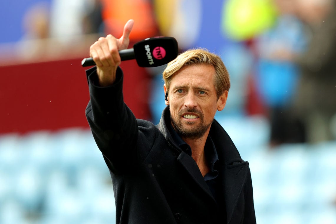 Former English footballer and current TNT Sports presenter, Peter Crouch, gestures a thumbs-up prior to the Premier League match between Aston Vill...