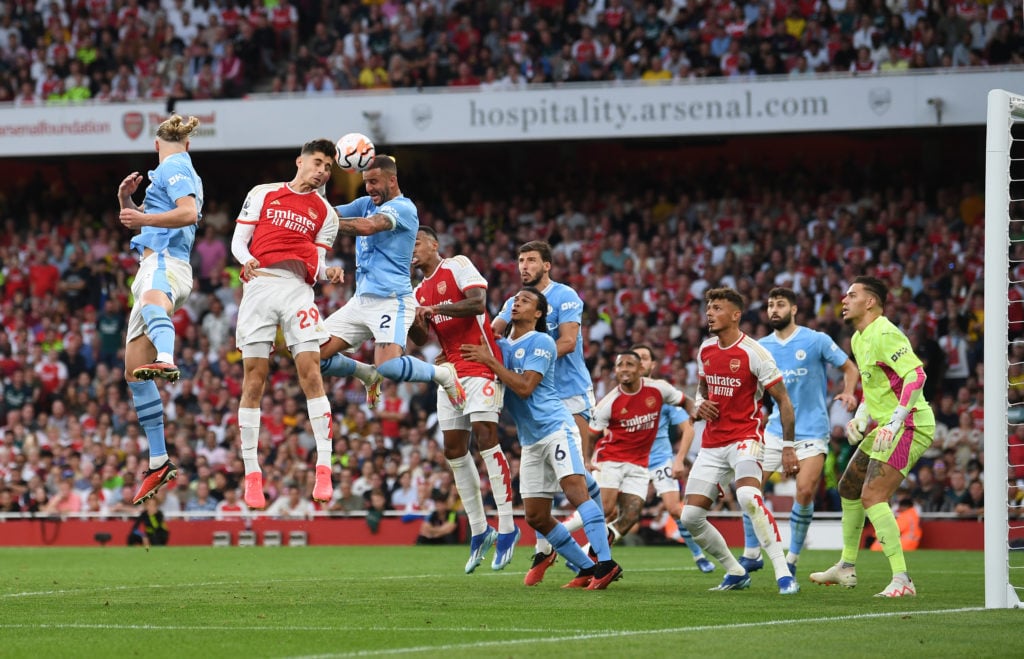 Kai Havertz of Arsenal challenges for the ball with Kyle Walker of Man City during the Premier League match between Arsenal FC and Manchester City ...