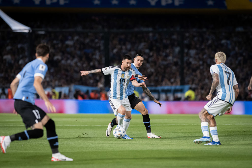 Lionel Messi of Argentina and Darwin Nuñez of Uruguay in...