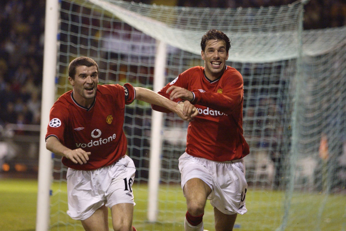 2 Apr 2002:  Ruud van Nistelrooy of Manchester United celebrates scoring the second goal with team-mate Roy Keane during the UEFA Champions League ...