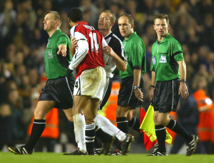 18 Dec 2001:  Thierry Henry of Arsenal is held back by Alan Shearer of Newcastle as he argues with referee Graham Poll at the end of the FA Barclay...