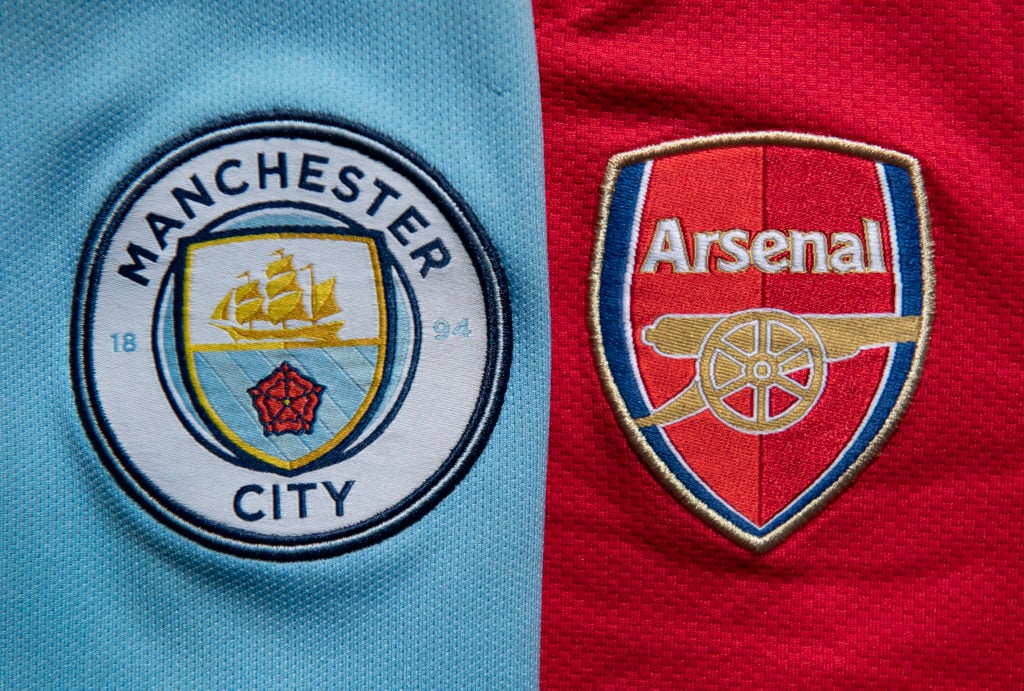 The Manchester City and Arsenal club crests on first team home shirts on April 24, 2020 in Manchester, England